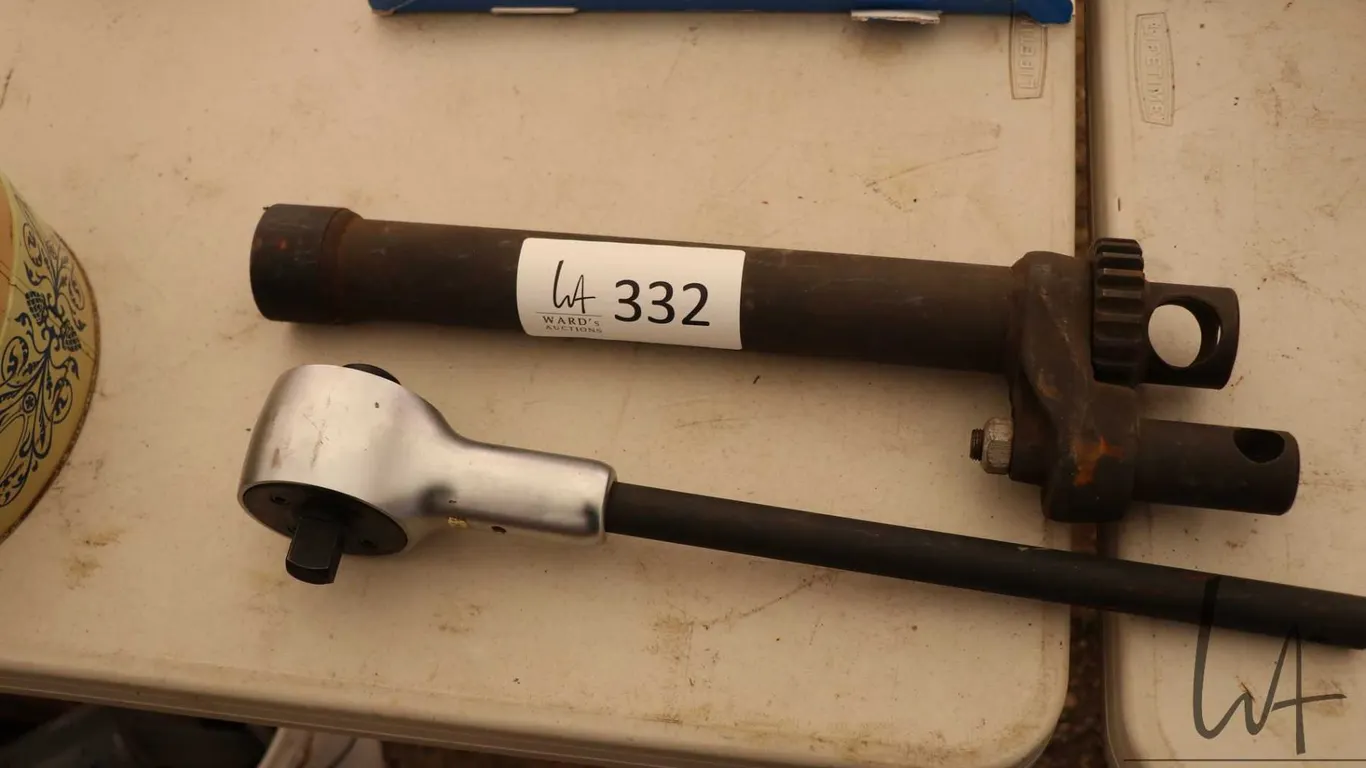 Two mechanical advantage wrenches, one vintage, one modern