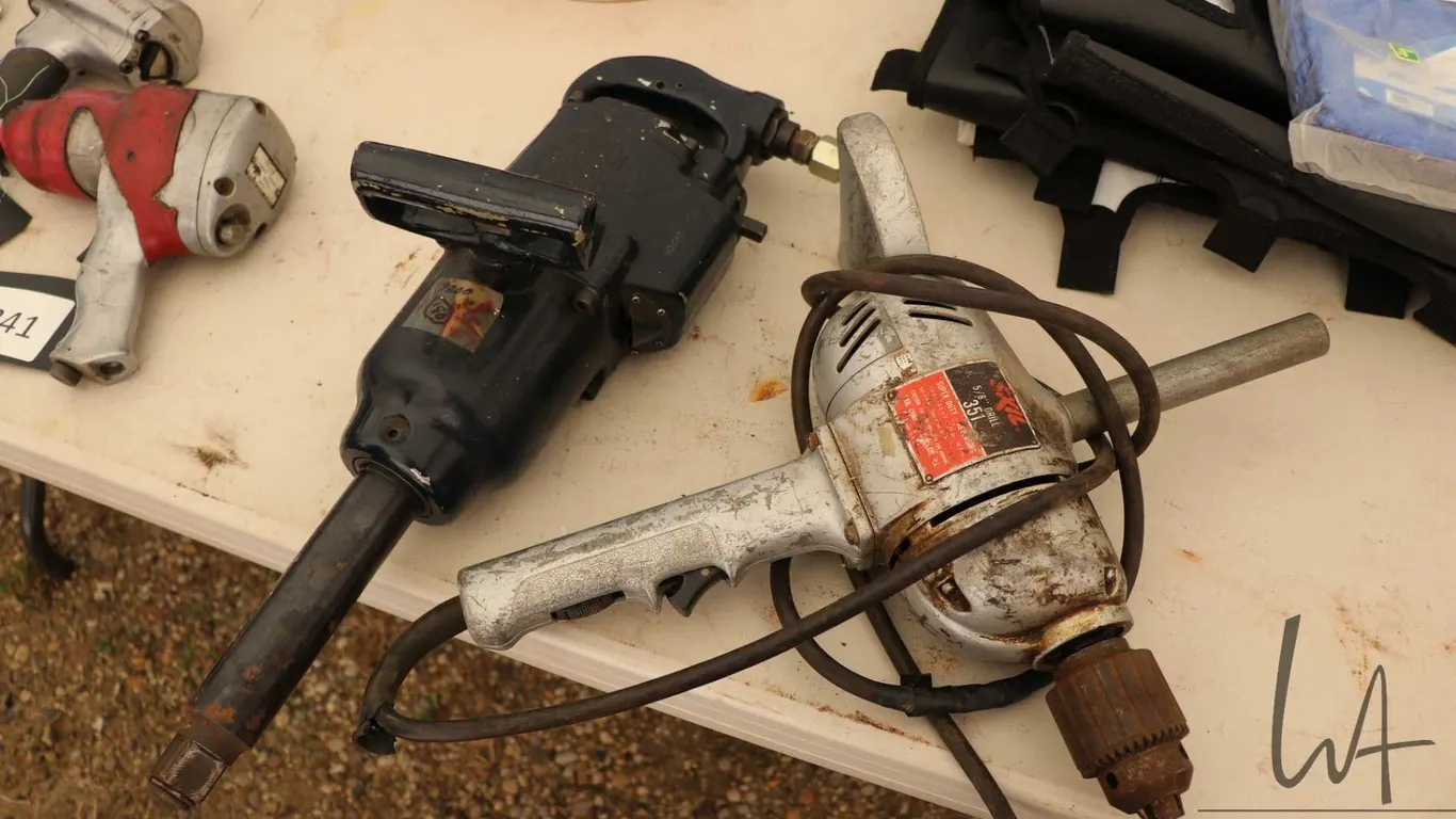 Large Skil electric drill and Central Pneumatic 1" impact wrench