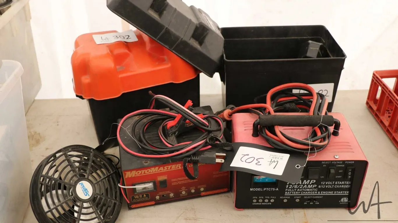 Two battery chargers, two battery boxes and miscellaneous electrical items
