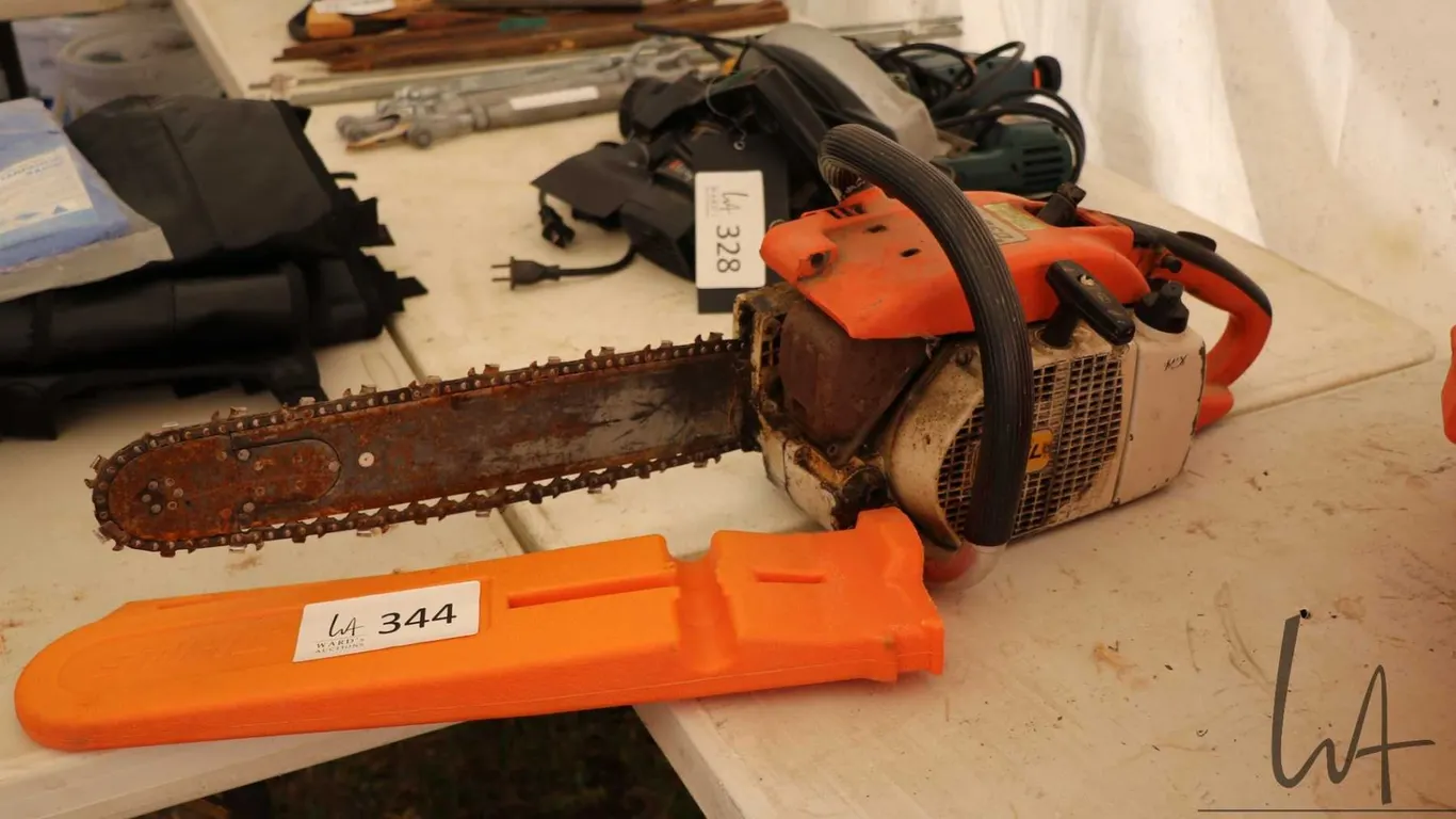 Stihl 032 AV chain saw, turns over freely and has compression