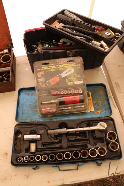 Assorted tools including fencing pliers, socket set, hammers, multi driver etc.