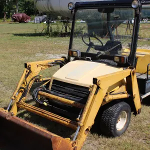 1983 Bombardier Diesel Loader with Extra Attachments