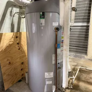 Water System: Water Heater, Expansion Tank with Miscellaneous Replacement Parts and Mixing Valve