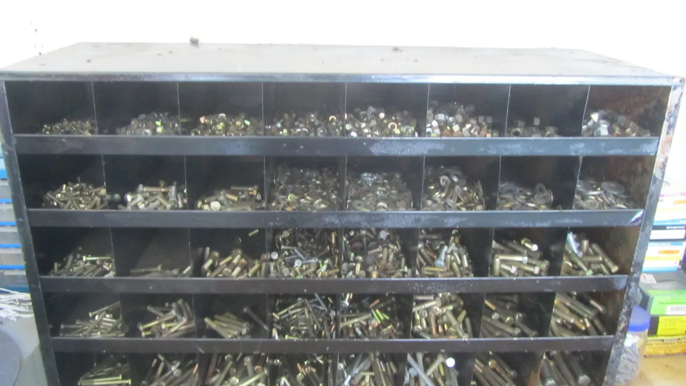 40-Drawer Hardware Organizer Full Of Assorted Nuts, Bolts, And Washers