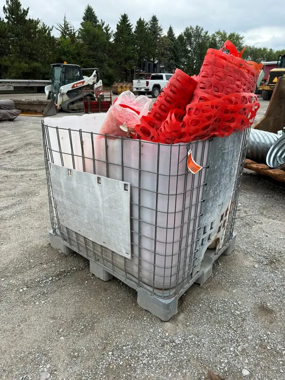 Pallet of Orange Snow Fence and Container
