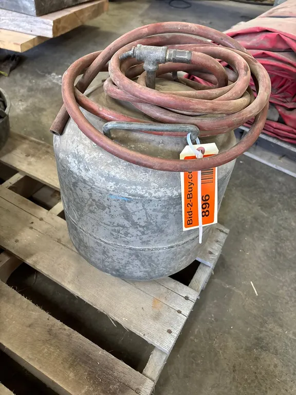 Metal Tank and Rubber Hose