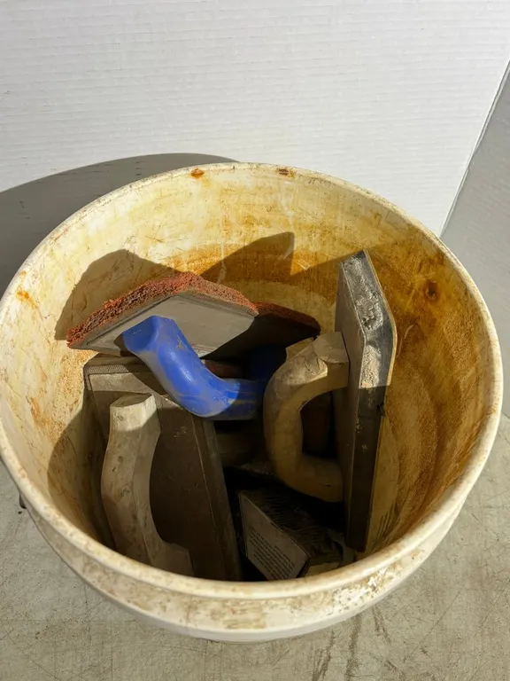 Five Gallon bucket of Concrete Hand Tools