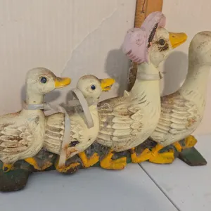 Vintaage cast iron duck family doorstop
