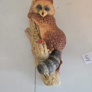 Vintage Bosson chalkware raccoon on a tree wall art