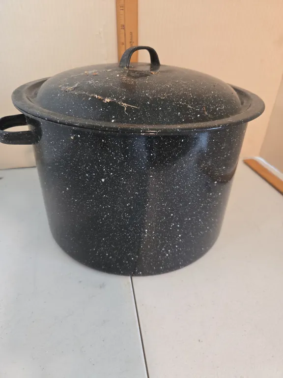 Vintage stoneware black pot and lid