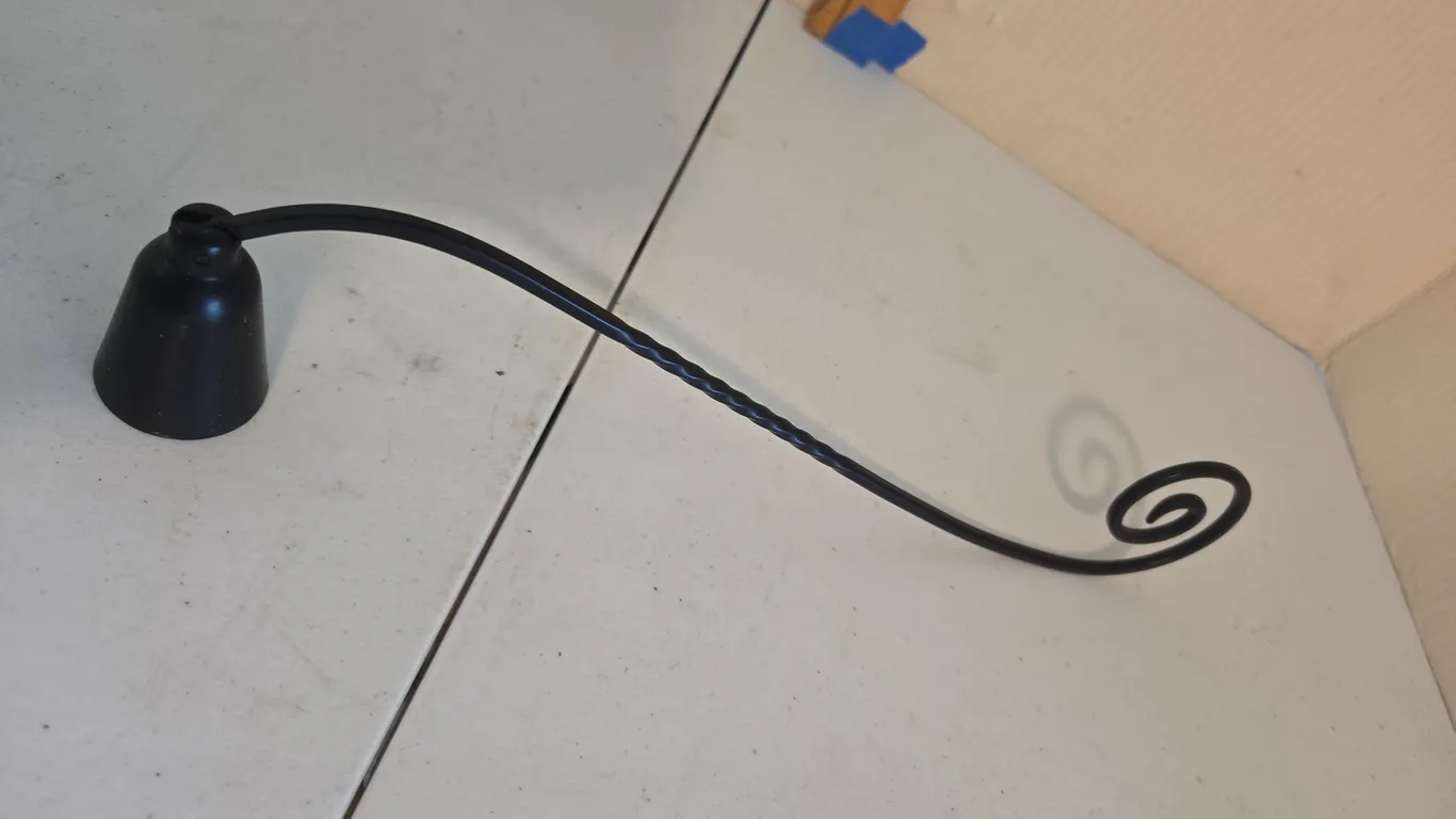 Vintage wrought iron candle snuffer