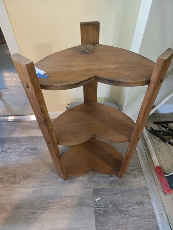 Small wooden heart-shaped shelf