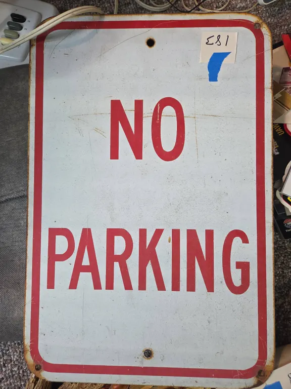 Vintage metal no parking sign