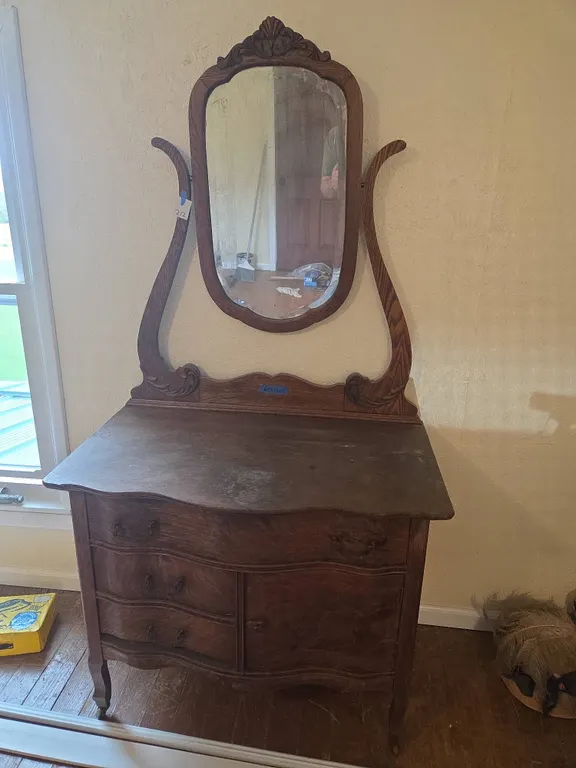 Antique oak serpentine front mirrored dresser