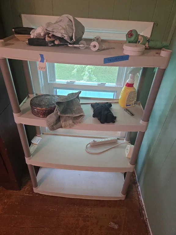 Plastic stack on shelving unit