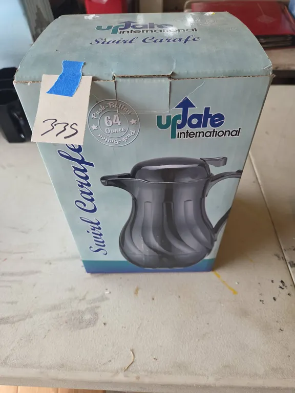 Update international swirl tariff coffee pot