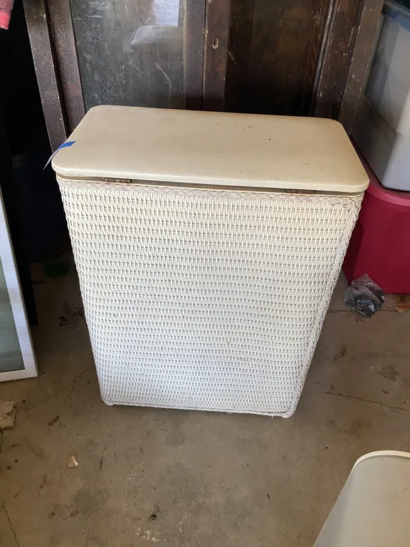 Vintage white rattan clothing hamper