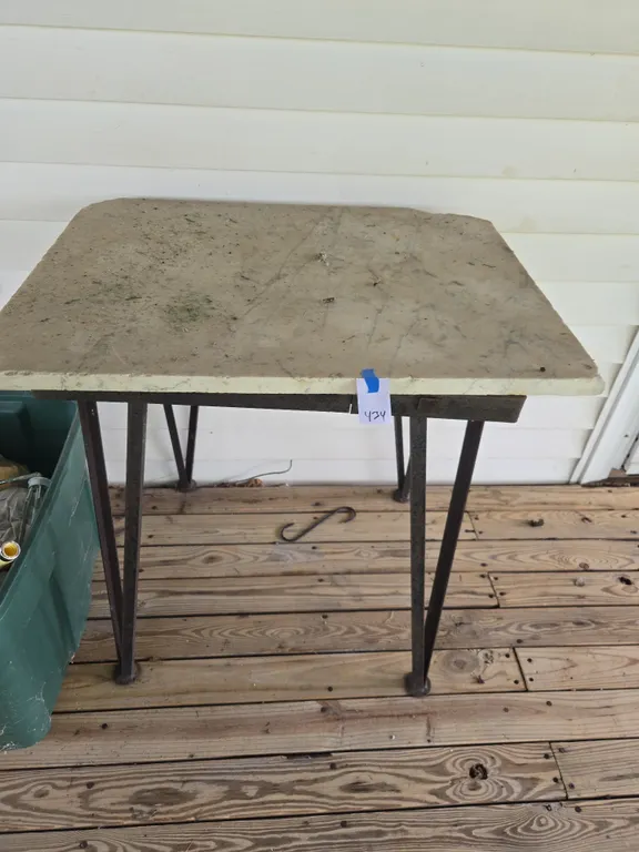 Rustic angle iron and stone outdoor table