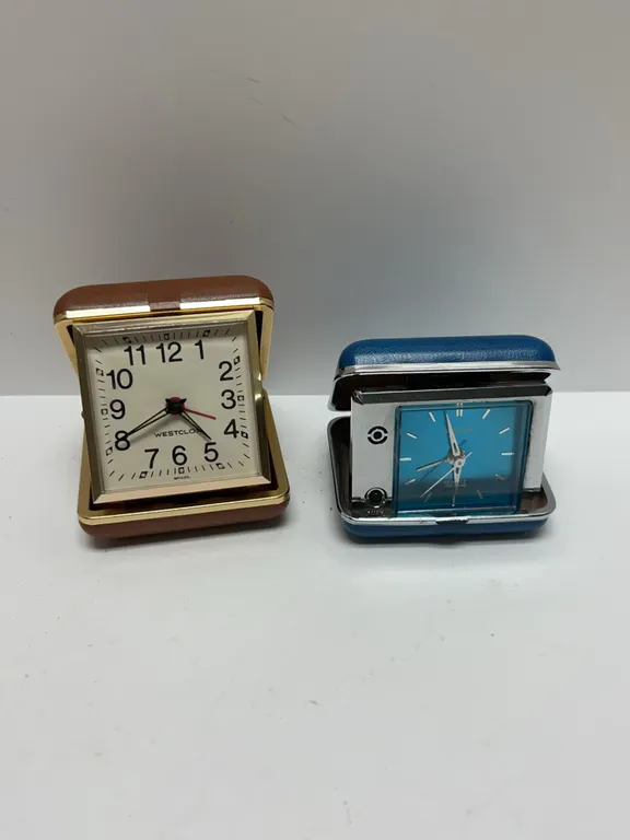 Westclox and Bulova Travel Alarm Clocks in Cases