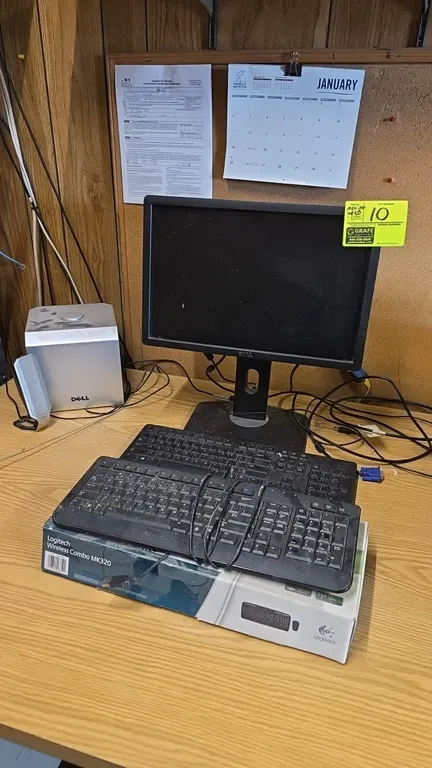 Dell 20" flat panel monitor package lot. Includes December 2013 Dell 20" monitor (S/N: CN-0PVGRC-74445-3C9-BXUL), Dell wired keyboard, Logitech keyboa