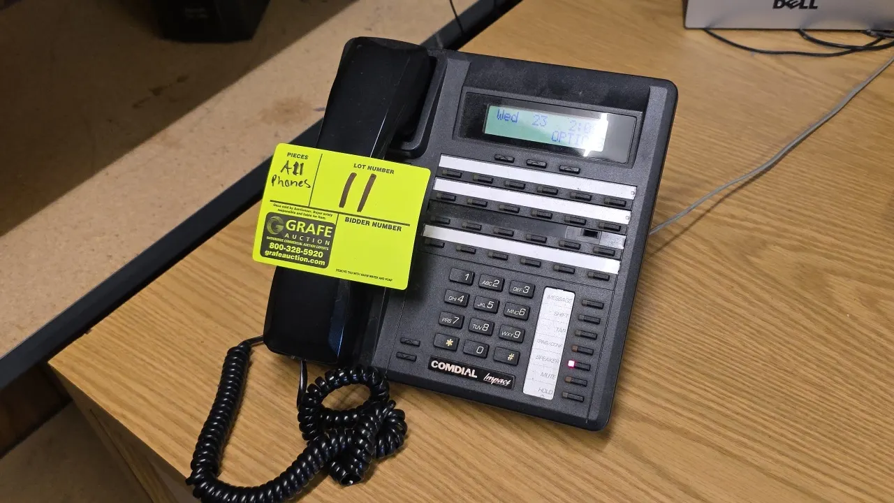 Comdial Impact 8324S-FB multi-line display business phones. Features LCD display, programmable line and feature buttons, speakerphone, and handsets wi