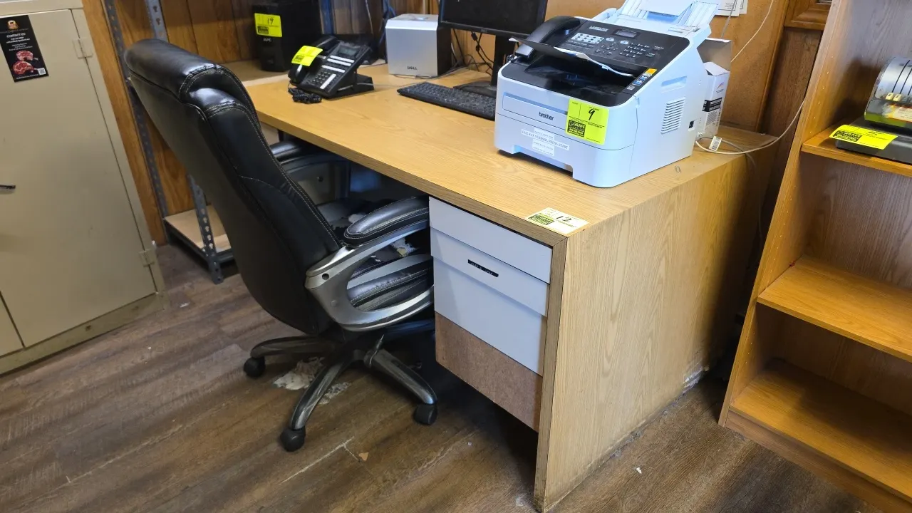 5'L laminate wood 6-drawer waterfall desk with Serta executive office chair. Desk features dual 3-drawer pedestals. Chair is mounted on a 5-star base