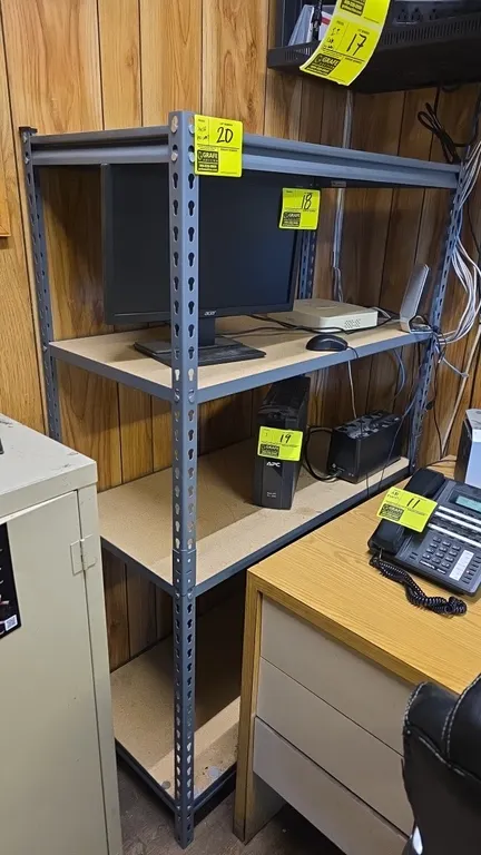 4-tier metal warehouse shelving rack. Features compressed wood shelves and gray boltless steel frame. 36" x 18" x 60". Contents not included.