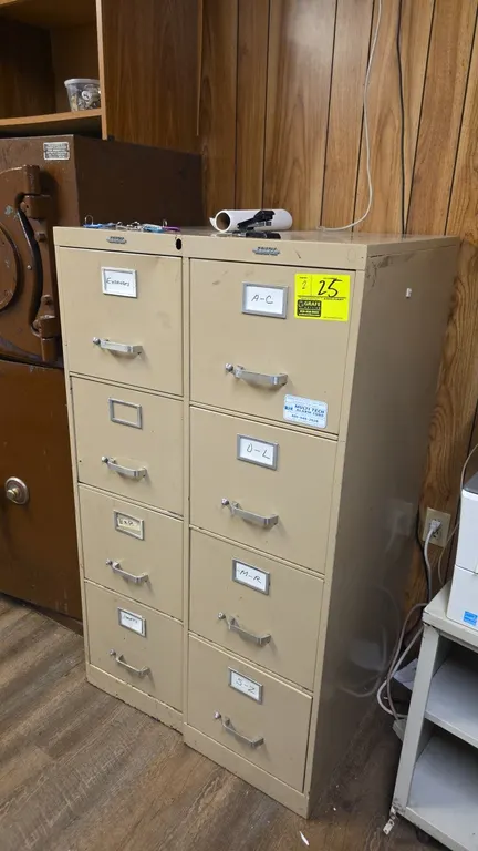 Envoy vertical 4-drawer file cabinets. Features metal construction with tan finish, integrated label holders, and pull handles with thumb latches. 52"
