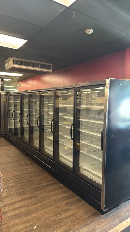 2005 Hussmann RLN-4 frozen food glass doors. Features adjustable wire shelving, LED interior lighting, and electric defrost. Electrical: 120V/208V. No