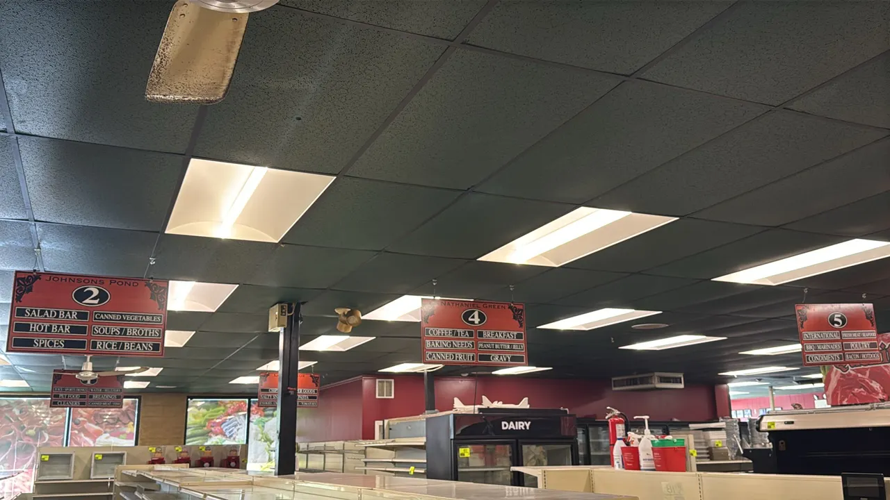 Hanging grocery store aisle marker signs. Features a red woodgrain-style finish with black and white lettering, numbered 1 through 5, and product cate