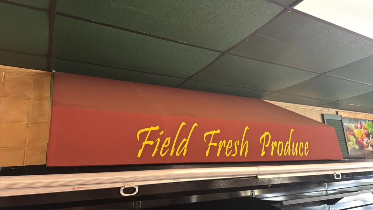 Store decor and signage package lot. Includes "Field Fresh Produce" fabric awning, (2) framed scenic and produce prints with decorative green shutters
