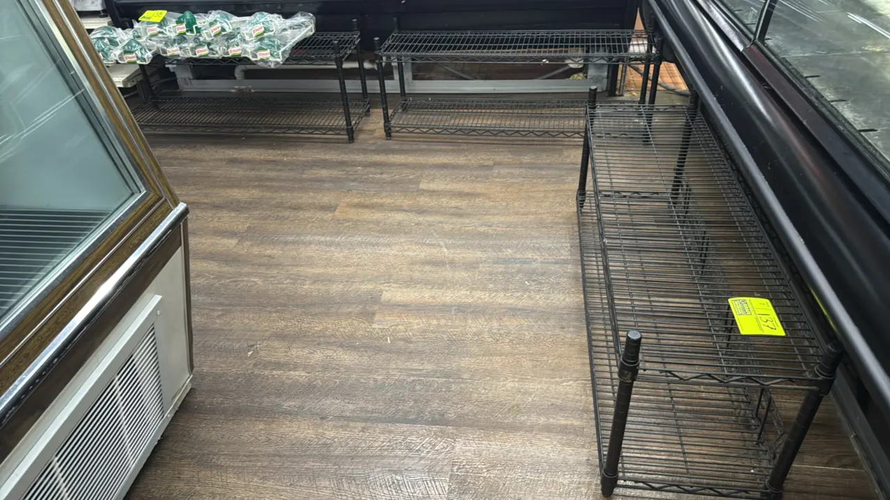 Coated metal 2-tier wire racks. Features 2 wire shelf tiers and black protective coating. Dimensions: 48" x 14" x 19". Contents not included.