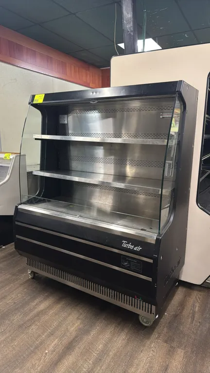 Turbo Air TOM-50MB open display refrigerated merchandiser. Features self-contained refrigeration, stainless steel interior, 2 stainless steel shelves