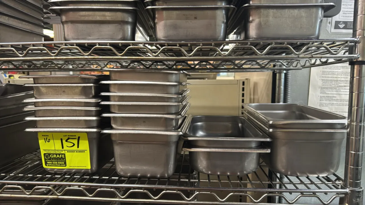 Stainless steel food pan inserts. Includes an assortment of 1/4-size and 1/3-size pans. 2" to 4" depth. Shelving not included.