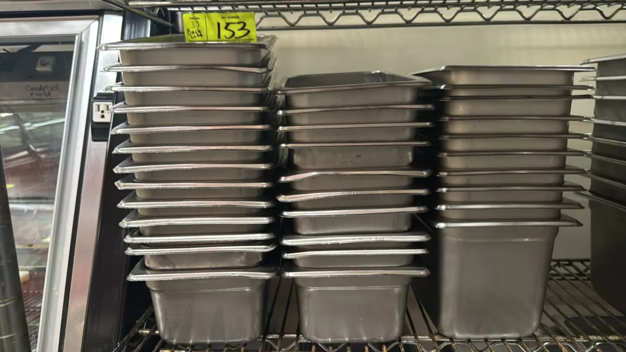 1/4-size stainless steel insert pans. Features stainless steel construction and nesting design. Dimensions: 4" to 6" depth. Shelving not included.