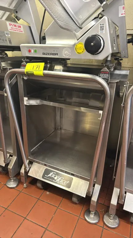 M&E Mfg Face to Face Equipment Deli Buddy portable slicer stand. Stainless steel construction. Features a tubular front handle bar, slide-out upper sh