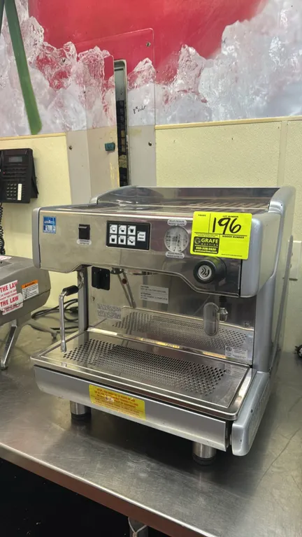 Wega EVD/1N-LA LB 4711 espresso machine. Features stainless steel construction, single group head, programmable push-button controls, dual pressure ga