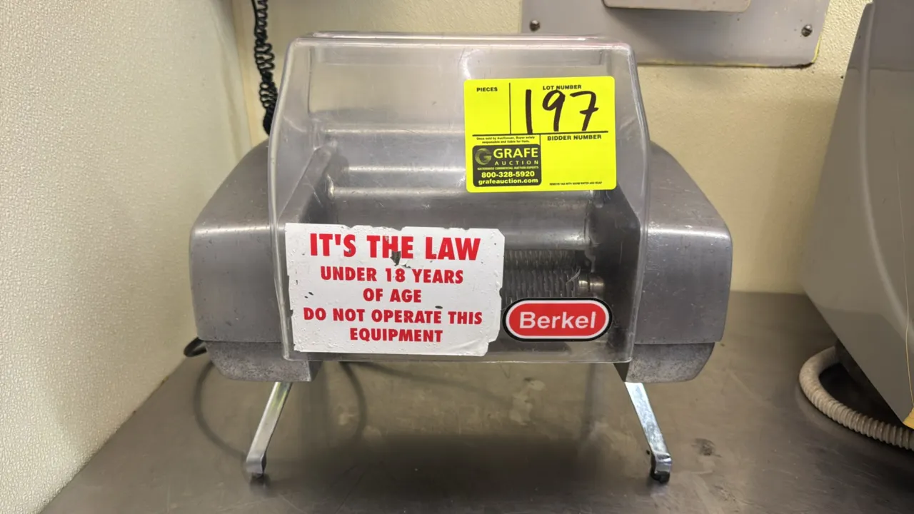 Berkel 705-STD meat tenderizer. Cast aluminum and stainless steel construction. Features dual tenderizer roller assemblies, transparent safety guard,