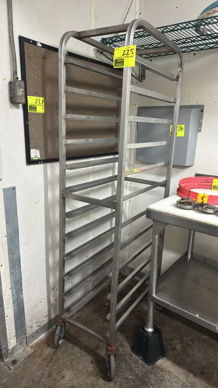 Stainless steel full-size platter rack. Features all-welded tubular frame construction and angle runner slides. Mounted on swivel casters.