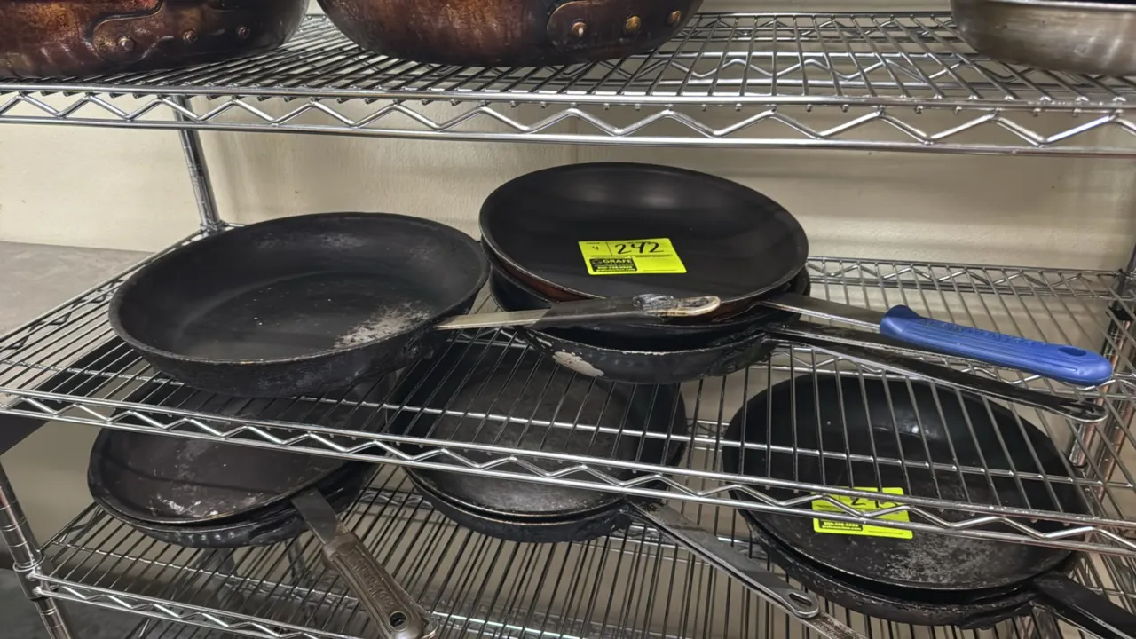 Aluminum frying pans. Features riveted metal handles and non-stick interior coating. Includes (3) 12" and (1) 14" pans.