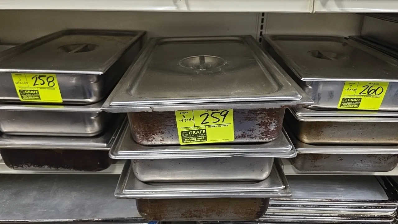 Full-size stainless steel insert pans with matching lids. Features stainless steel construction and recessed handle covers.