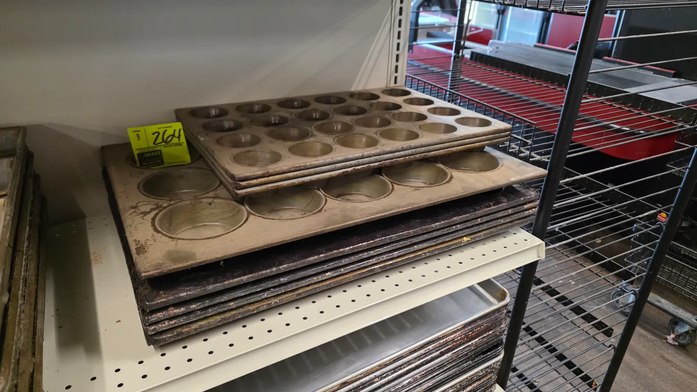 Commercial muffin and cupcake baking pans. Includes (3) 24-count mini cupcake pans, (1) 15-count large muffin pan, and (4) 24-count large cupcake pans