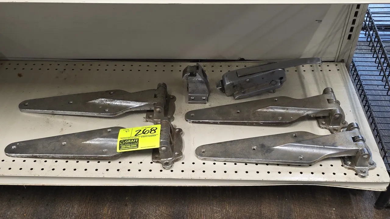 Stainless steel walk-in cooler/freezer door hinges and latch hardware. Features heavy-duty strap hinges and door latch assembly with strike.
