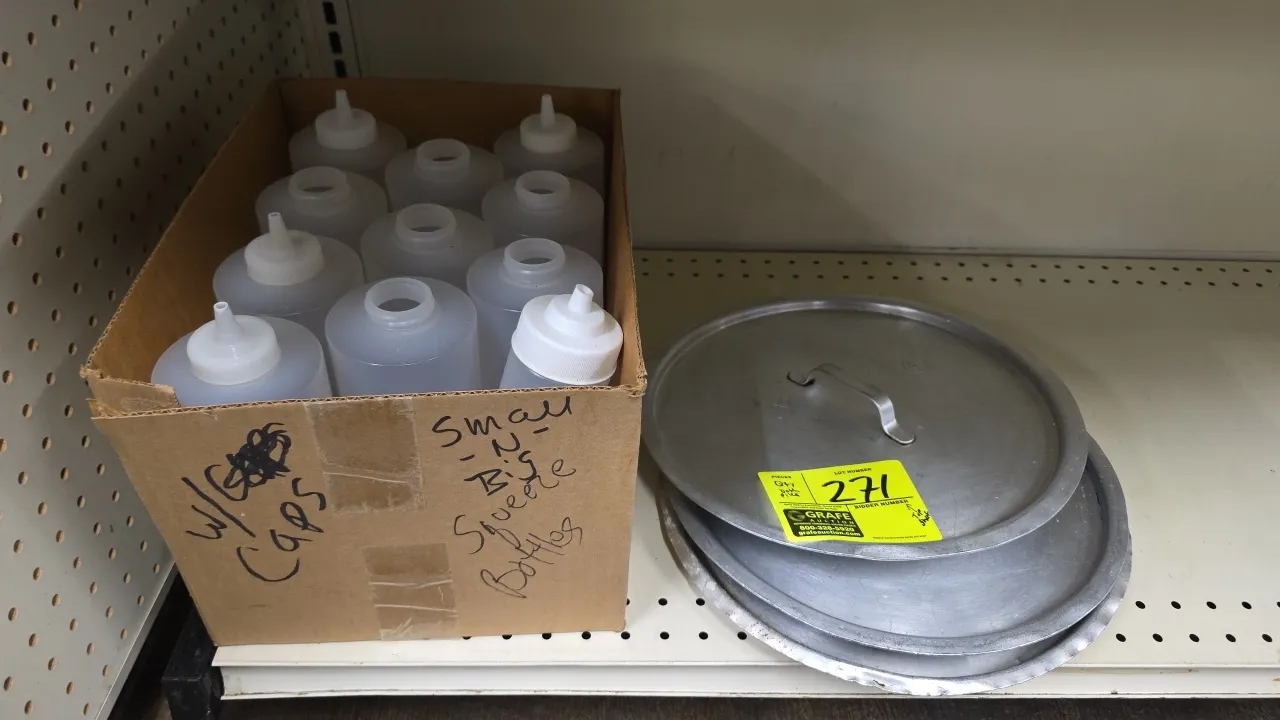 Assorted polyethylene squeeze bottles and (3) 13" aluminum pot lids. Includes assorted small and large translucent plastic squeeze bottles with dispen