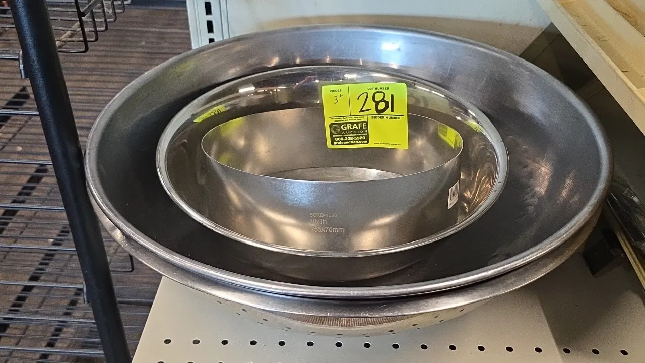 Stainless steel food prep and baking lot. Includes (3) stainless steel mixing bowls (14" and 18" diameter) and (1) 10" x 3" stainless steel cake ring