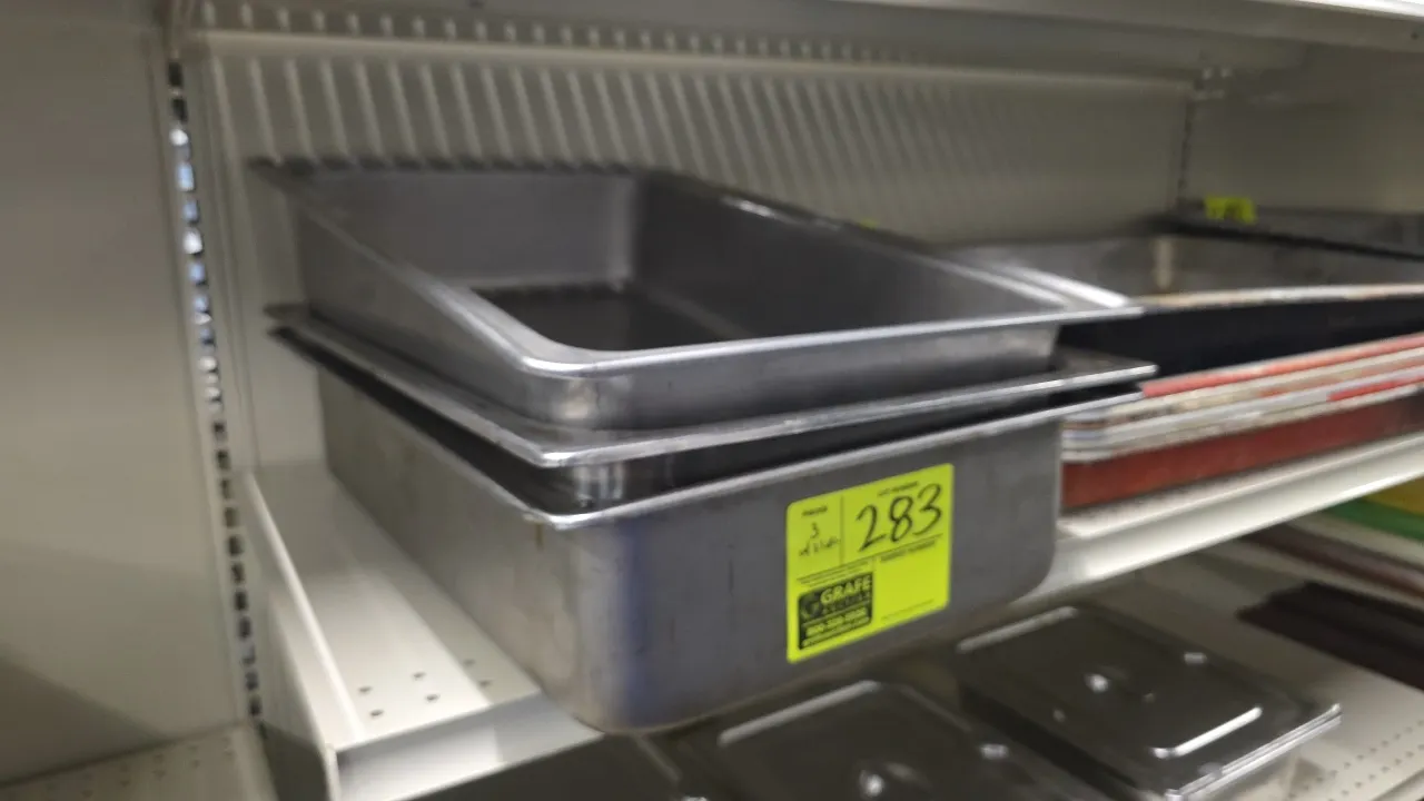 Full-size stainless steel insert pans. Features 4" depth.
