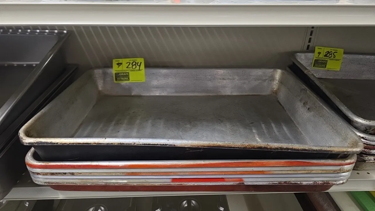 Full-size aluminum sheet pans. Aluminum construction with rolled rim edges. Features 2" to 4" depths.