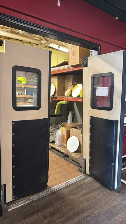 Poly swing doors. Features viewing windows, lower impact kick plates, and perimeter edge seals. Includes mounting hinge hardware. Dimensions: 30"W x 8