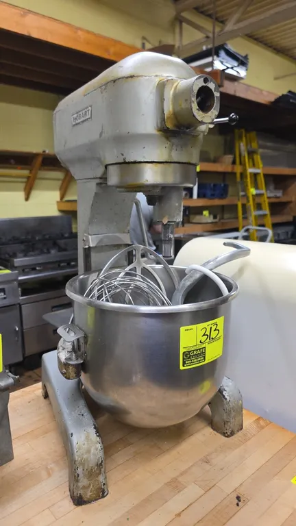 Hobart A-200 20 qt. countertop planetary mixer. Includes stainless steel mixing bowl, flat beater, wire whip, dough hook, and secondary dough hook. Fe