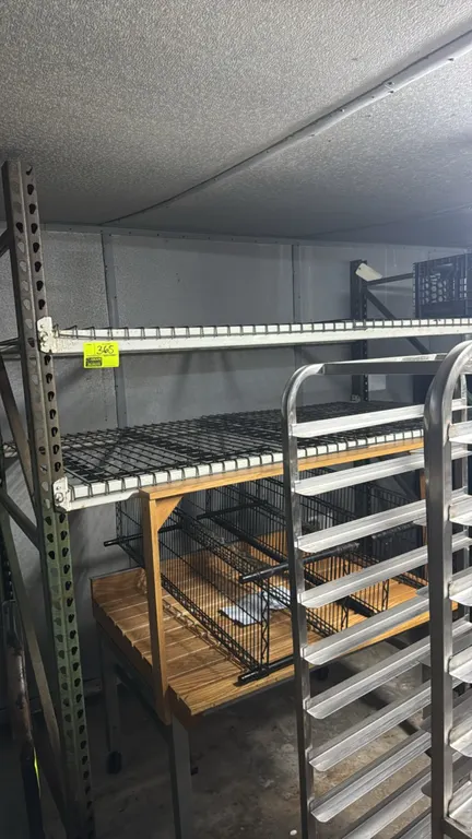 Metal 2-tier teardrop racking. Features 3" crossbars and wire decking. Dimensions: 88"L x 48"W x 90"H. Contents not included.